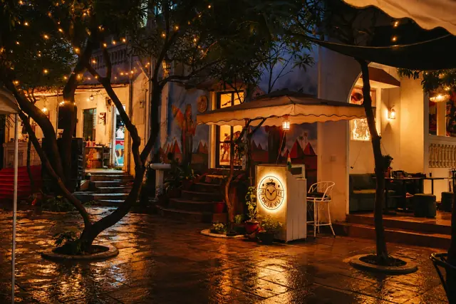 String-lit courtyard at night, Bavdhan